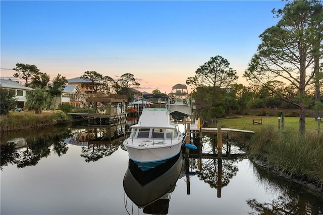 dock area with a water view