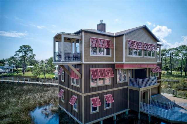 exterior space featuring a balcony