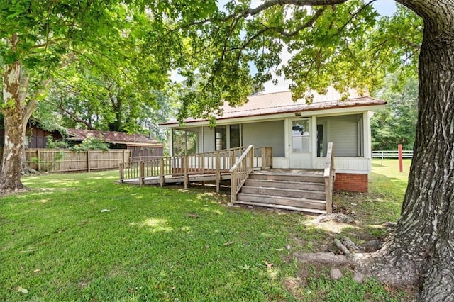 4221 Bay Front Rd, Mobile, AL 36605 - rear view of property featuring covered porch and metal roof