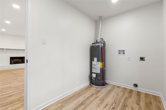 utility room with water heater