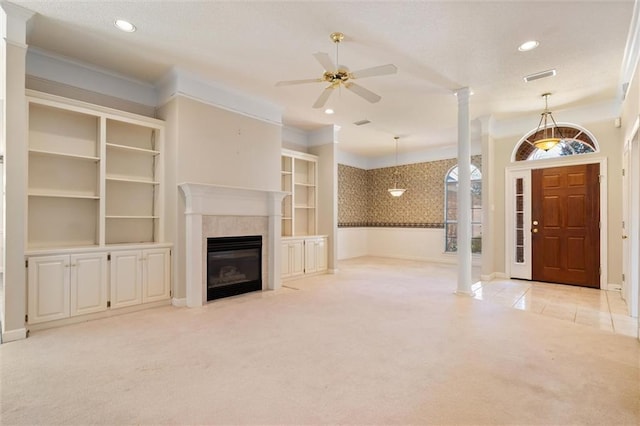 unfurnished living room featuring wallpapered walls, a tile fireplace, light colored carpet, ornamental molding, and recessed lighting