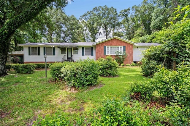 5405 Dogwood Ct, Mobile, AL 36693 - ranch-style home with a front lawn and brick siding