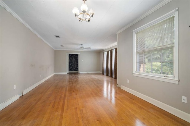 5405 Dogwood Ct, Mobile, AL 36693 - unfurnished room with a chandelier, ornamental molding, light wood finished floors, baseboards, and a ceiling fan