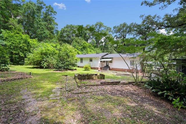 5405 Dogwood Ct, Mobile, AL 36693 - view of green lawn featuring entry steps