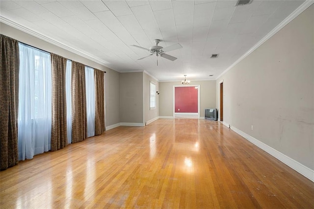 5405 Dogwood Ct, Mobile, AL 36693 - unfurnished living room with a ceiling fan, light wood-style floors, crown molding, a chandelier, and baseboards