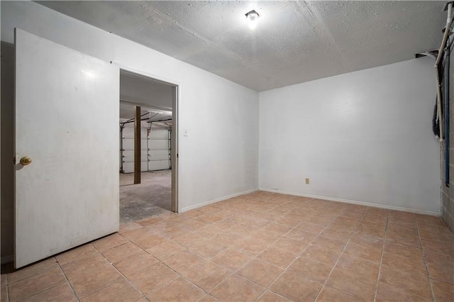 empty room with a textured ceiling