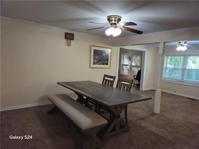 dining area with dark carpet, ceiling fan, and crown molding