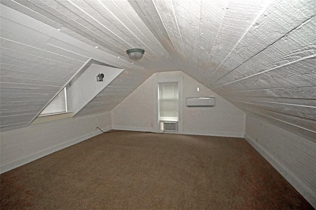 additional living space featuring carpet, lofted ceiling, and wood ceiling