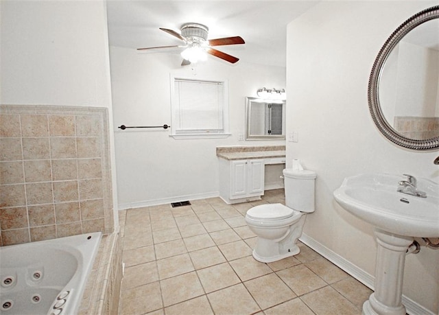 bathroom with ceiling fan, a relaxing tiled tub, toilet, and tile patterned floors