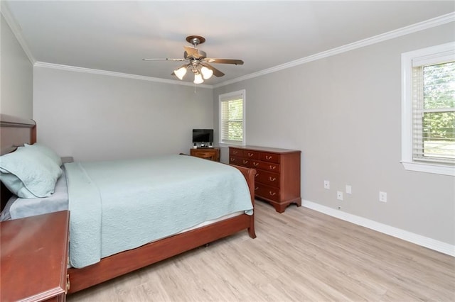 bedroom with light hardwood / wood-style flooring, ceiling fan, crown molding, and multiple windows