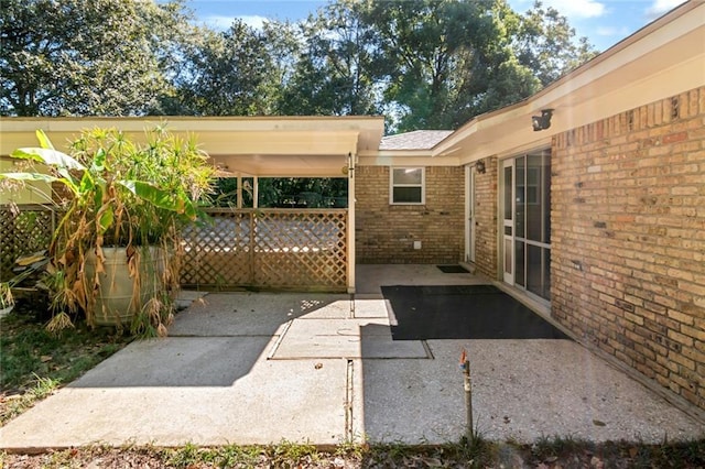 view of patio / terrace with a carport