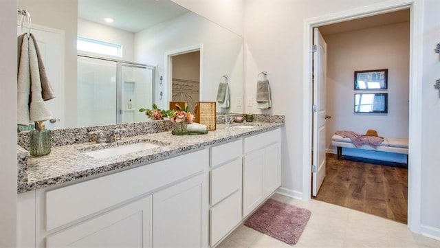 7327 Hawkins Mnr N, Mobile, AL 36695 - full bath with a stall shower, double vanity, a spacious closet, and ensuite bathroom