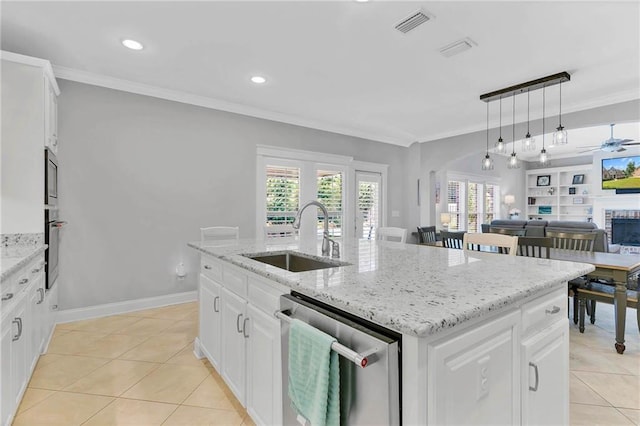 8662 Daintree Ct, Daphne, AL 36526 - kitchen featuring stainless steel appliances, light tile patterned flooring, open floor plan, an island with sink, and ceiling fan