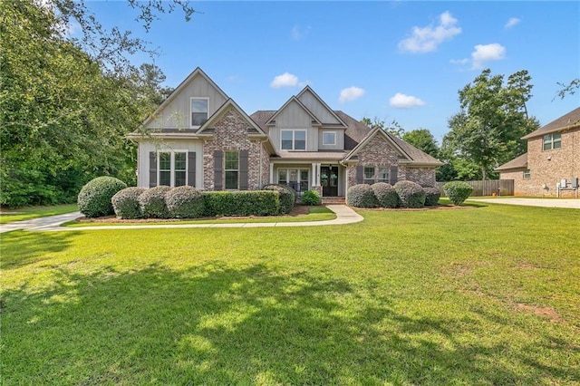 8662 Daintree Ct, Daphne, AL 36526 - craftsman inspired home with board and batten siding and brick siding