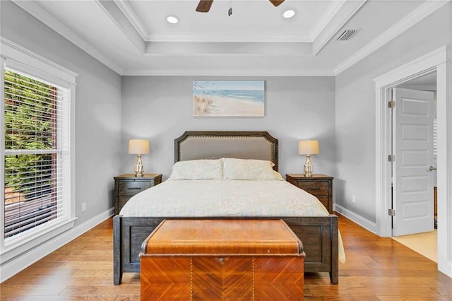 8662 Daintree Ct, Daphne, AL 36526 - bedroom with hardwood / wood-style floors, a tray ceiling, ceiling fan, ornamental molding, and recessed lighting