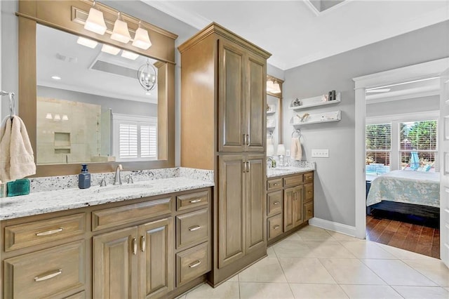 8662 Daintree Ct, Daphne, AL 36526 - ensuite bathroom with vanity, ornamental molding, tile patterned flooring, and healthy amount of natural light