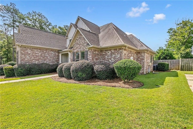 8662 Daintree Ct, Daphne, AL 36526 - view of home's exterior with brick siding and a shingled roof