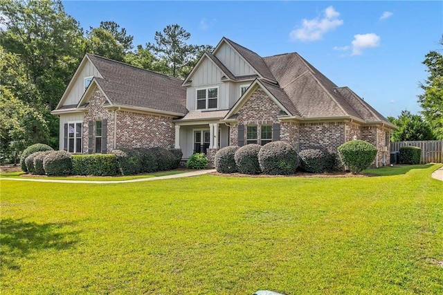 8662 Daintree Ct, Daphne, AL 36526 - craftsman-style house featuring board and batten siding, brick siding, and roof with shingles