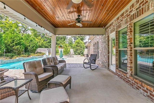 8662 Daintree Ct, Daphne, AL 36526 - view of patio / terrace with ceiling fan and an outdoor pool