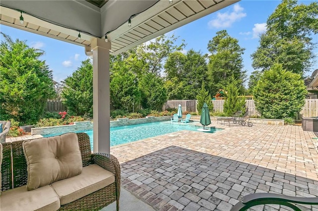 8662 Daintree Ct, Daphne, AL 36526 - view of pool featuring a patio area, a fenced backyard, and outdoor lounge area