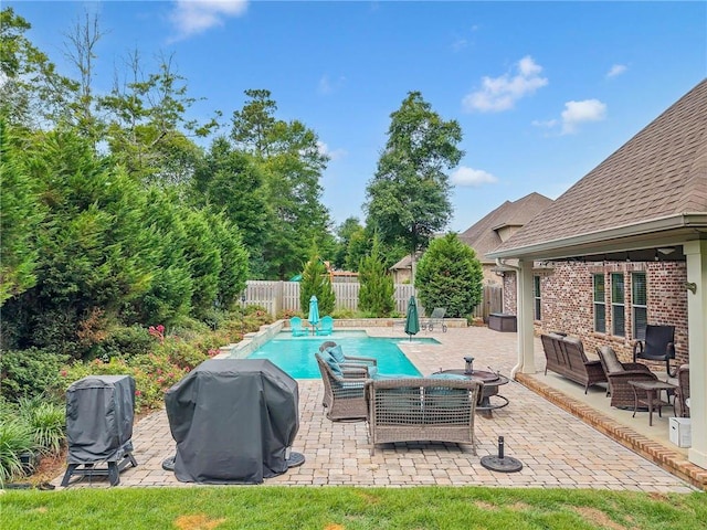 8662 Daintree Ct, Daphne, AL 36526 - view of swimming pool featuring grilling area, a fenced backyard, a patio area, and an outdoor living space