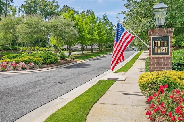 8662 Daintree Ct, Daphne, AL 36526 - view of asphalt street featuring sidewalks and curbs