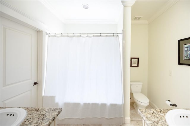 bathroom with toilet, visible vents, vanity, and ornamental molding