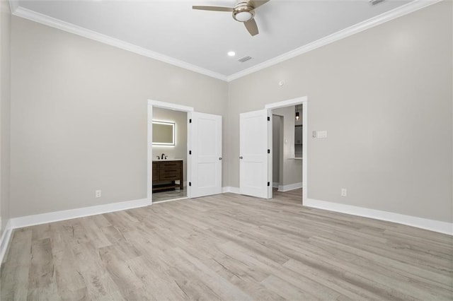 unfurnished bedroom featuring visible vents, connected bathroom, baseboards, ornamental molding, and light wood-style floors