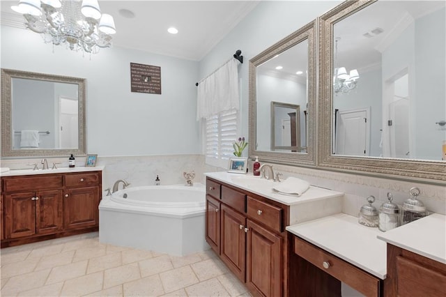 bathroom featuring a tub to relax in, ornamental molding, a chandelier, and vanity