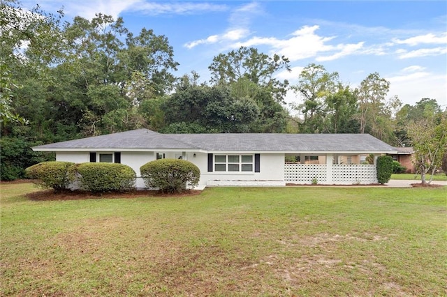 ranch-style house with a front yard