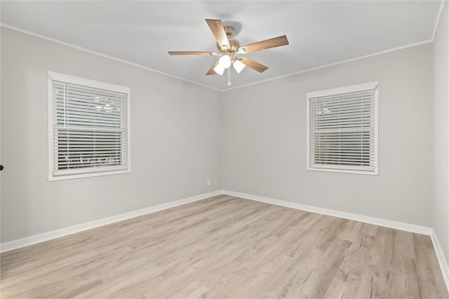 empty room with light hardwood / wood-style floors, ceiling fan, and ornamental molding