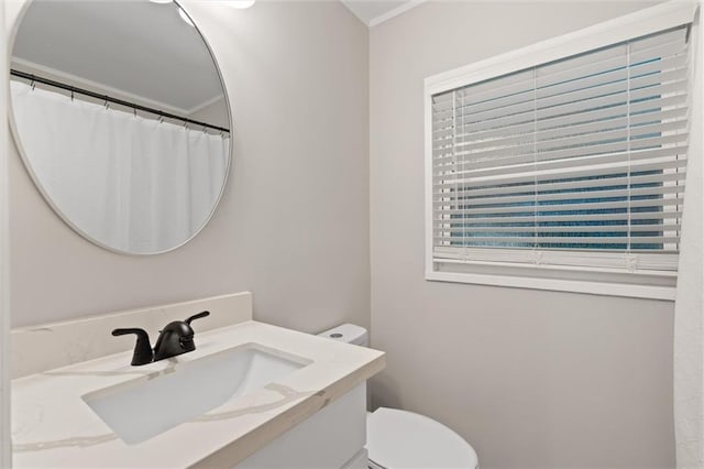 bathroom with vanity and toilet