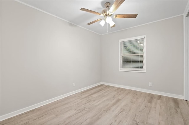 empty room featuring light hardwood / wood-style flooring, ceiling fan, and crown molding