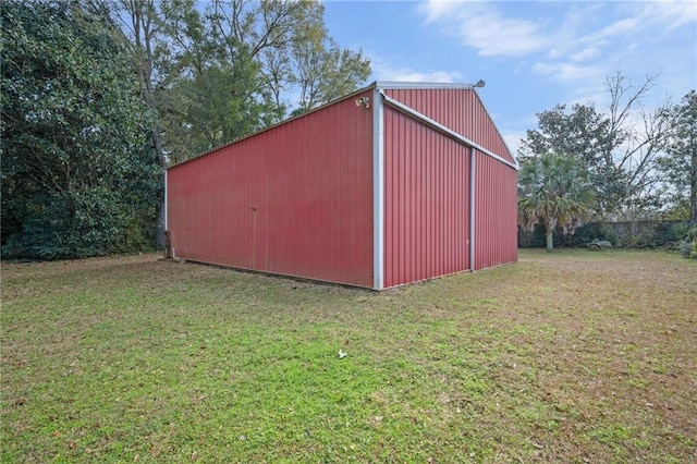 view of outdoor structure featuring a yard