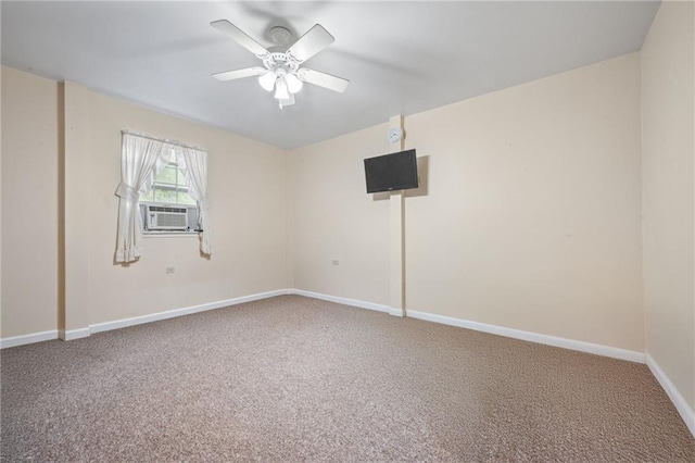 unfurnished room with ceiling fan, cooling unit, and carpet flooring