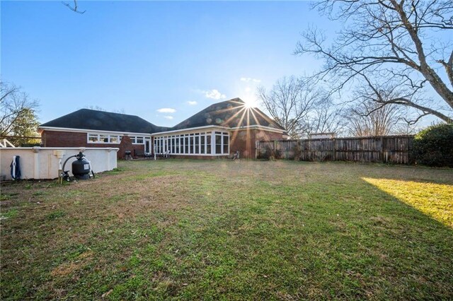 view of yard featuring a fenced in pool