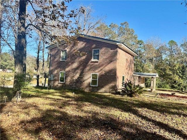 view of property exterior featuring a lawn