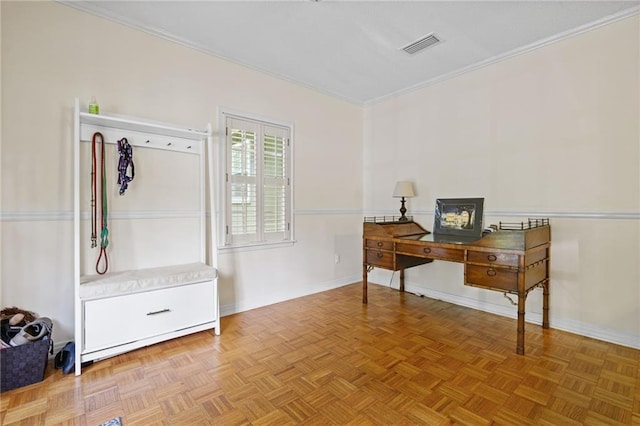 office featuring baseboards, ornamental molding, and visible vents