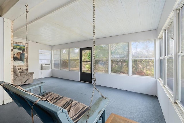 sunroom / solarium with cooling unit and a healthy amount of sunlight