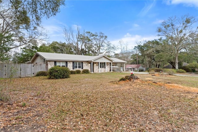 single story home with fence