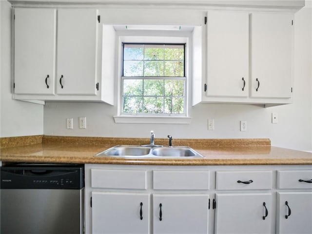 kitchen featuring sink, white cabinetry, and stainless steel dishwasher