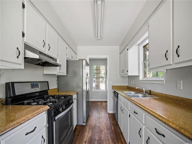 kitchen featuring white cabinetry, stainless steel appliances, sink, and dark hardwood / wood-style floors