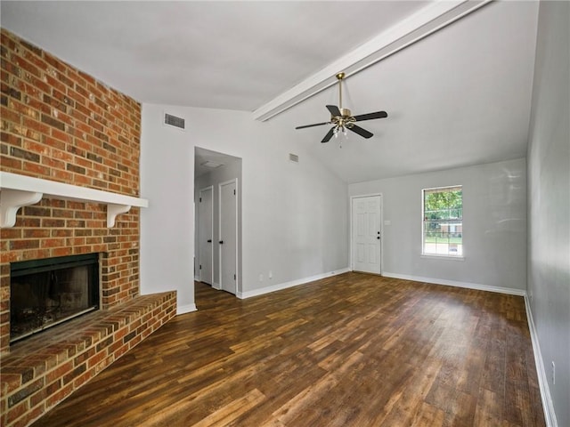 unfurnished living room featuring dark wood-type flooring, ceiling fan, vaulted ceiling with beams, and a fireplace