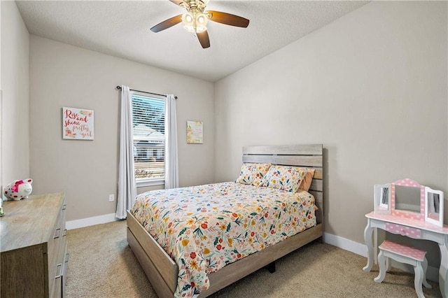 bedroom with ceiling fan and light colored carpet