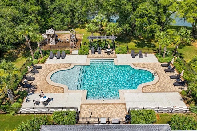 view of swimming pool featuring a patio area