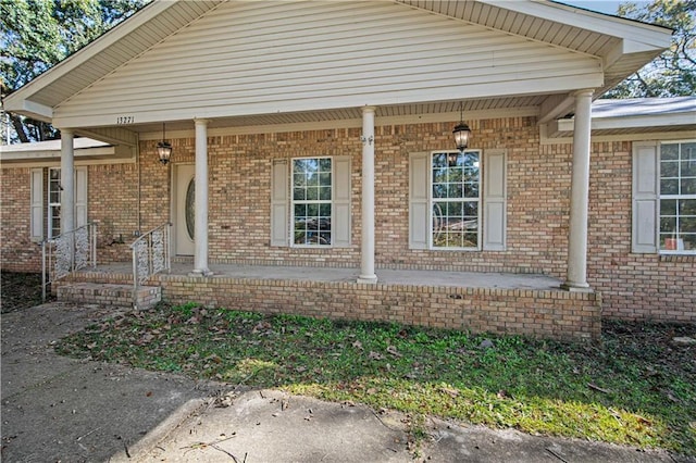 entrance to property with covered porch