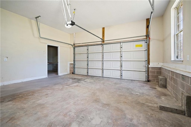 garage featuring a garage door opener