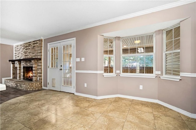 unfurnished dining area featuring a fireplace, french doors, tile patterned floors, and ornamental molding