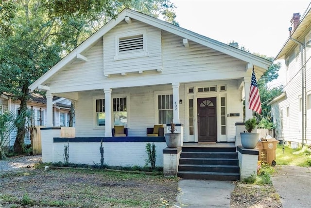 bungalow-style home featuring covered porch