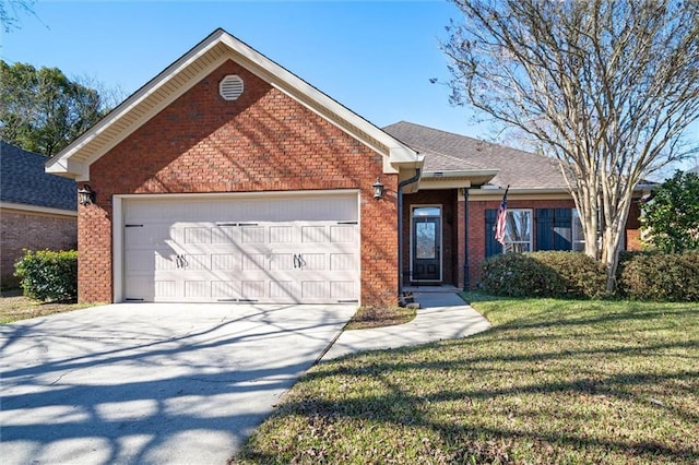 view of front of home with a garage and a front yard